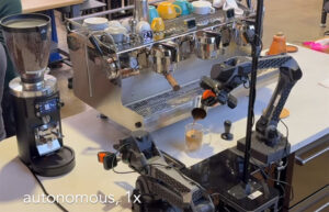 Physical Intelligence says its VLA model can accelerate robot productivity for tasks such as making espresso, shown here.