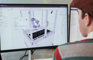 A person looking at the Intrinsic Flowstate platform.